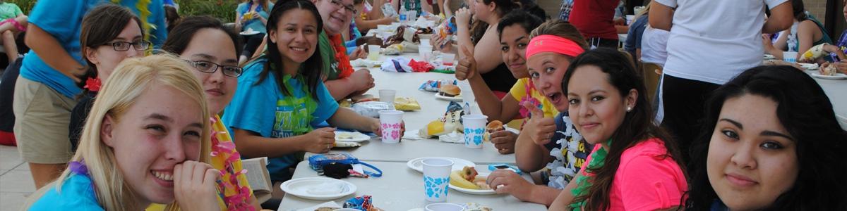 Students eating at a block party